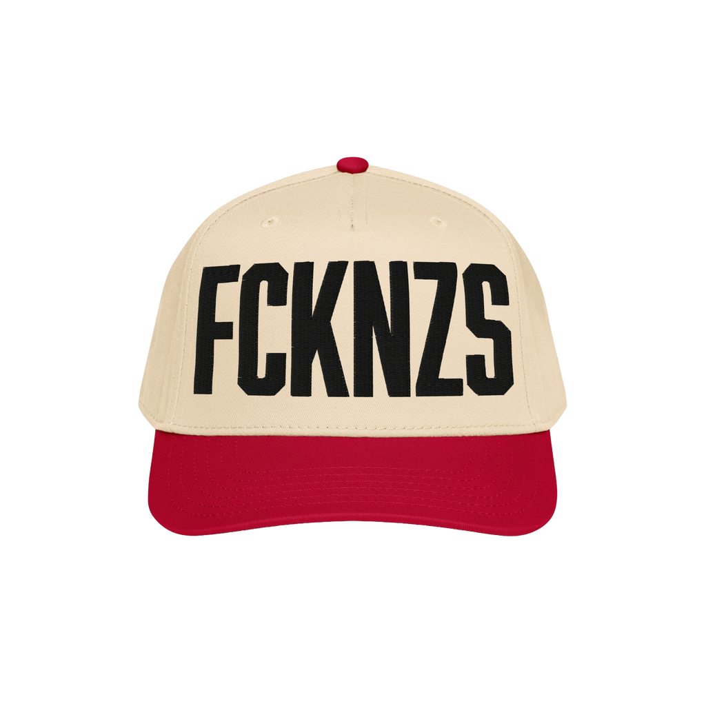 FCKNZS Hat featuring a light beige crown and red bill with bold black FCKNZS embroidery, embodying a strong anti-fascist mess