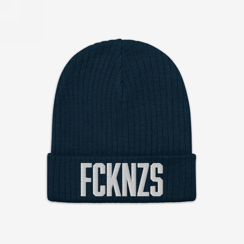Navy-blue ribbed knit beanie with FCKNZS embroidered in bold white letters, representing an anti-fascist stance.