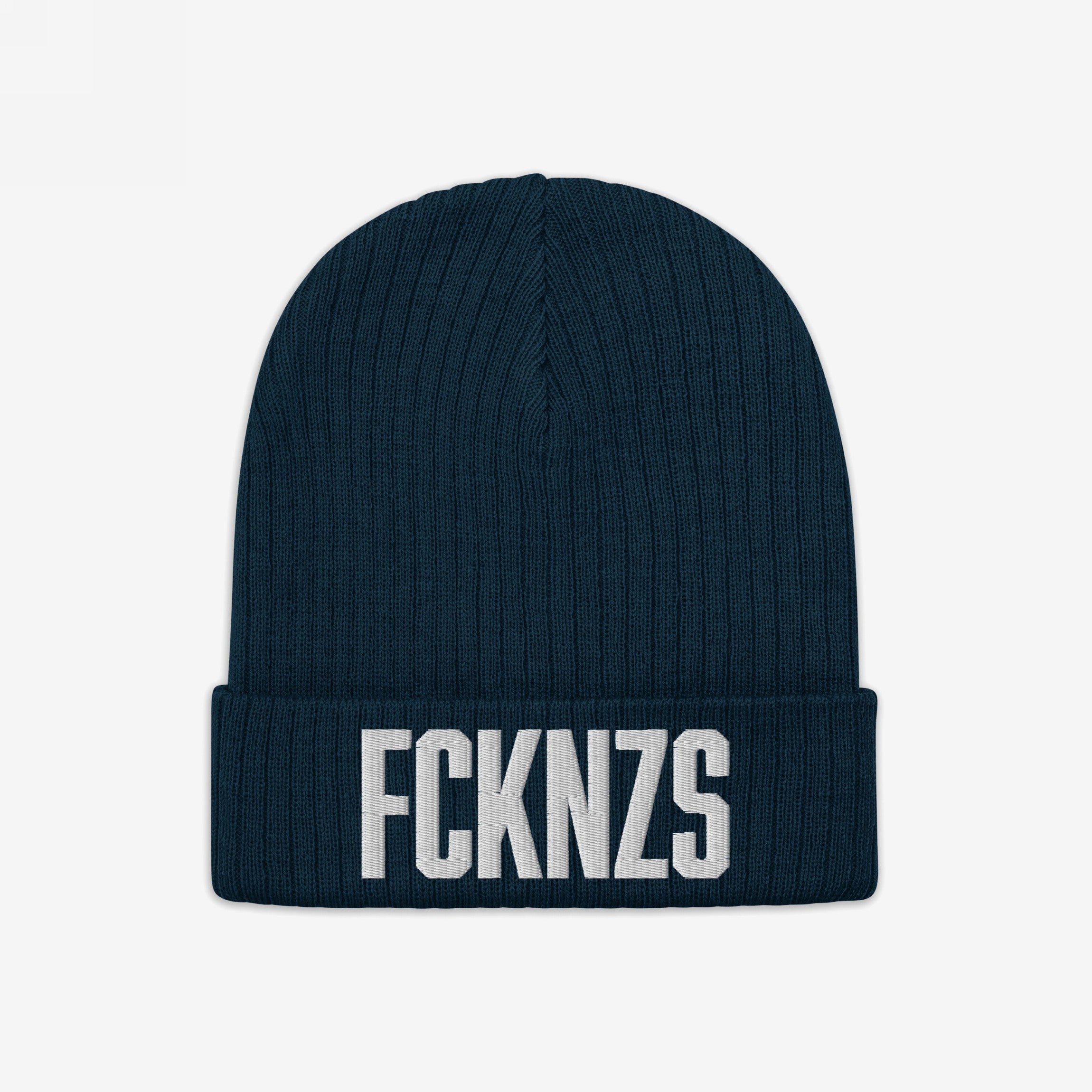 Navy-blue ribbed knit beanie with FCKNZS embroidered in bold white letters, representing an anti-fascist stance.