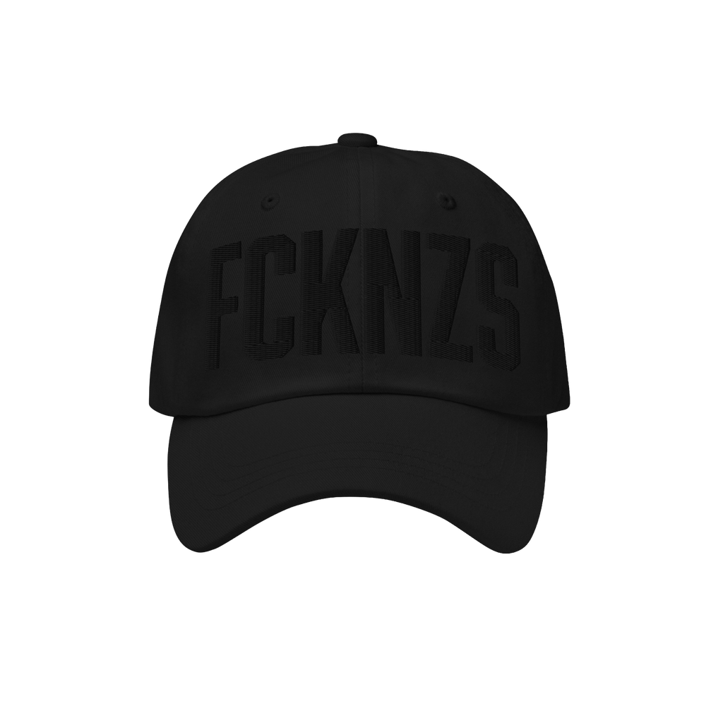 FCKNZS Hat: A black six-panel baseball cap with FCKNZS embroidered in black, symbolizing anti-fascist protest. Features a cur