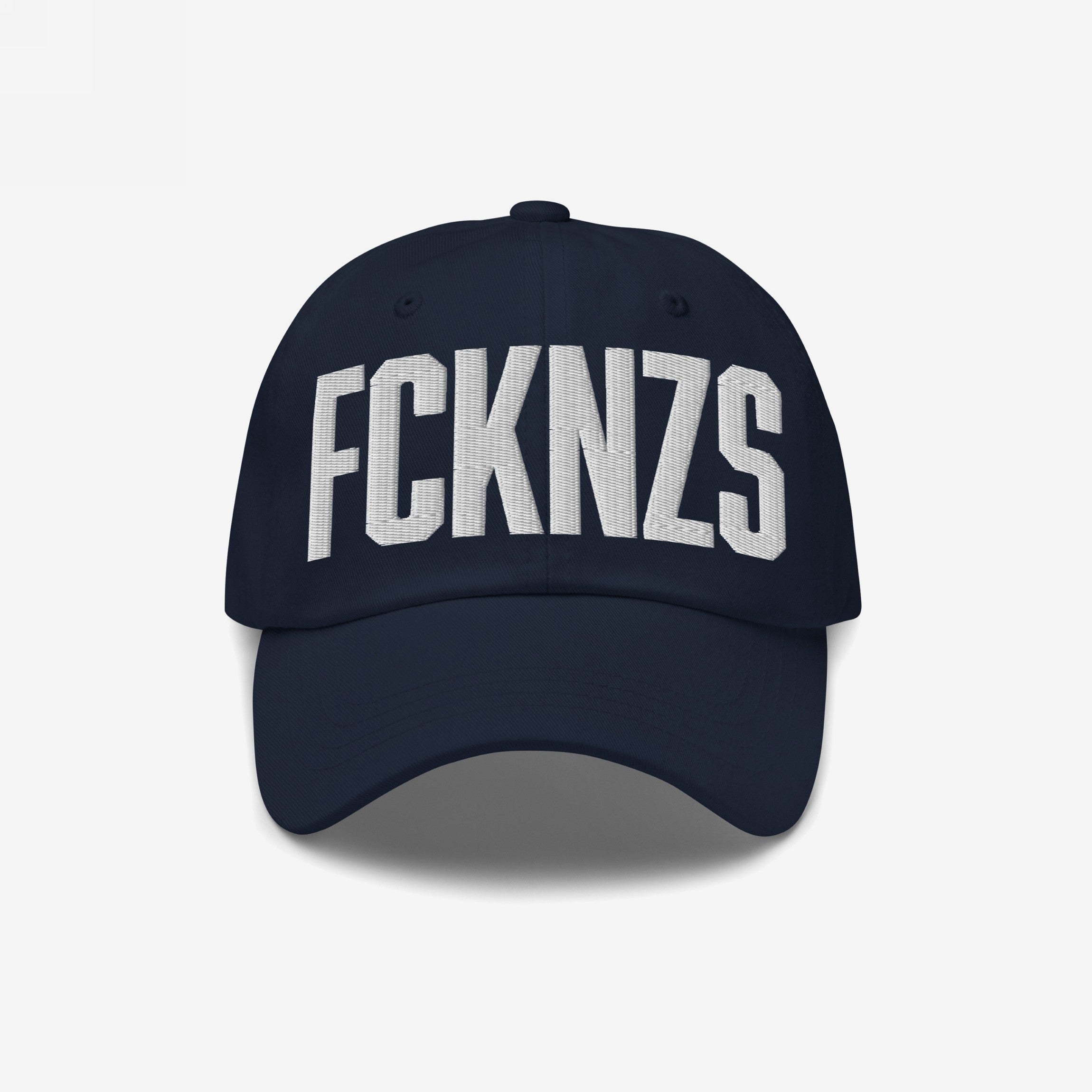 Navy blue FCKNZS Hat with curved brim, featuring bold white block letters for an anti-fascist statement. Ideal for expressing clear boundaries in everyday life or activism.