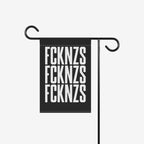 FCKNZS Garden Flag on a metal stand, featuring bold, stacked white letters on black. This anti-fascist flag, measuring 12 x 18, makes a clear statement for outdoor display.
