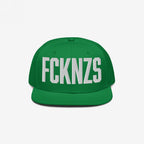 Green FCKNZS Hat featuring a flat-brim snapback style with bold white embroidered letters, embodying an anti-fascist message.