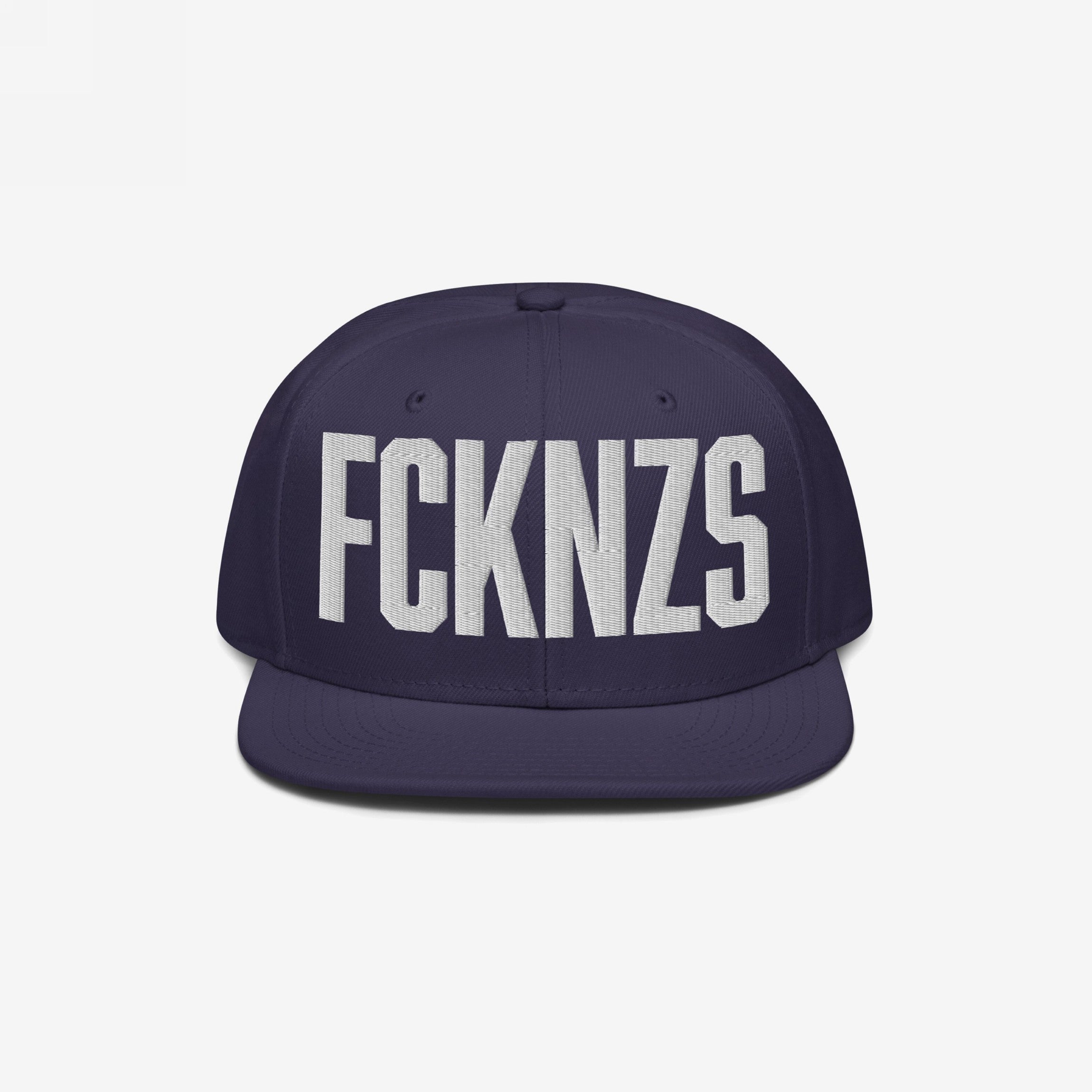 Dark-blue FCKNZS Hat with white block letters, embodying an anti-fascist message. Ideal for making a bold statement at protests or in daily life.