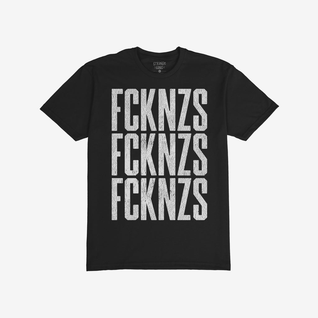 FCKNZS T-shirt features a bold, distressed white FCKNZS print repeated thrice, embodying a strong anti-fascist message in a grunge-style font, perfect for those opposing hate and promoting equality.