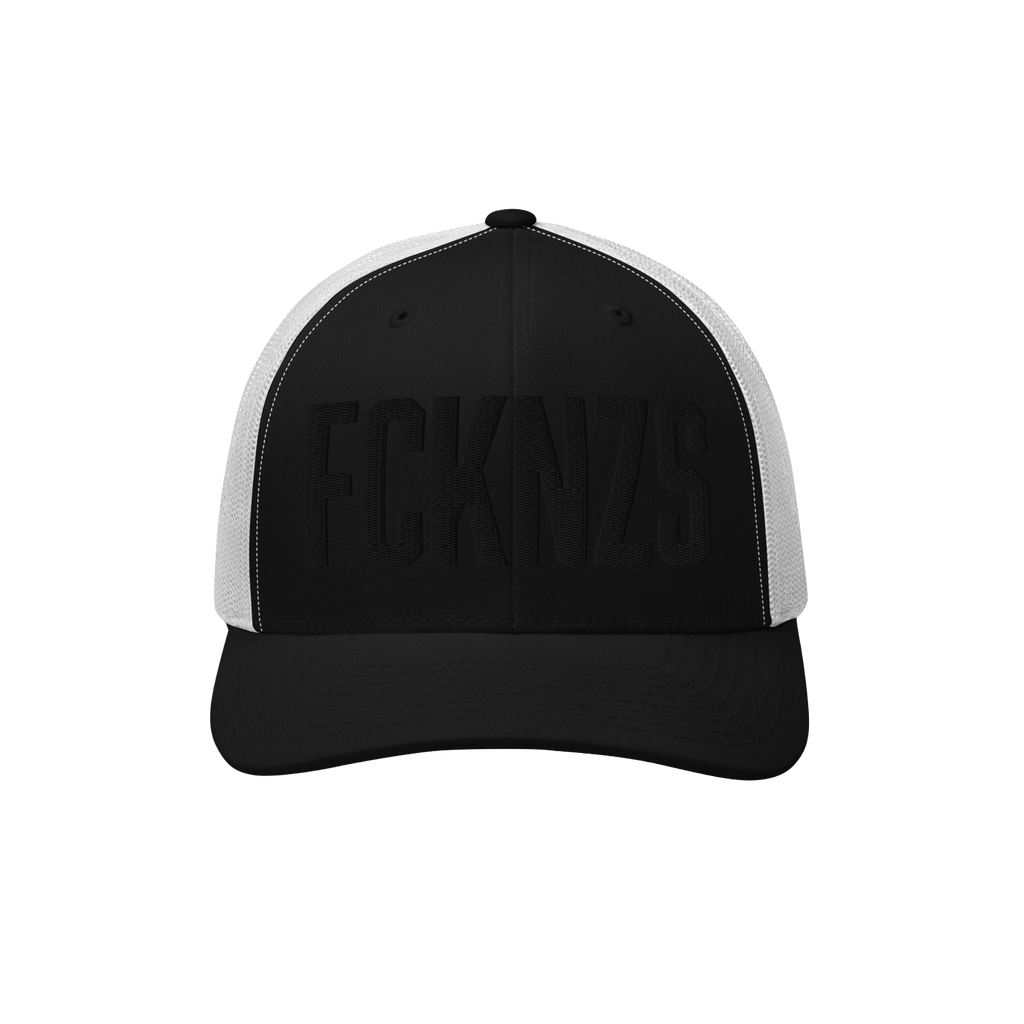 FCKNZS Hat: Black-and-white trucker cap with FCKNZS embroidered in bold black letters, featuring white mesh sides. A statemen