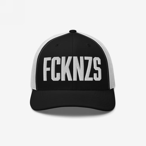 Black-and-white trucker cap featuring bold, white embroidered FCKNZS letters, symbolizing an anti-fascist message.