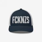 Collage of reaction thumbnails featuring startled, screaming, and cartoonish figures, each overlaid with Tamil captions, representing the bold anti-fascist stance of the FCKNZS Hat collection.