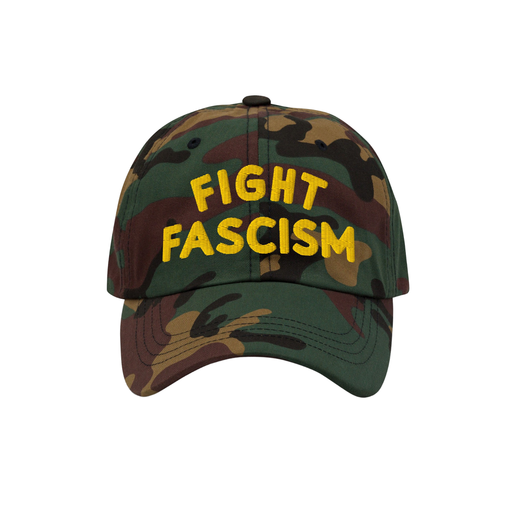 Camo-pattern Fight Fascism Hat with bold yellow FIGHT FASCISM slogan, designed for anti-fascist visibility. Ideal for marches