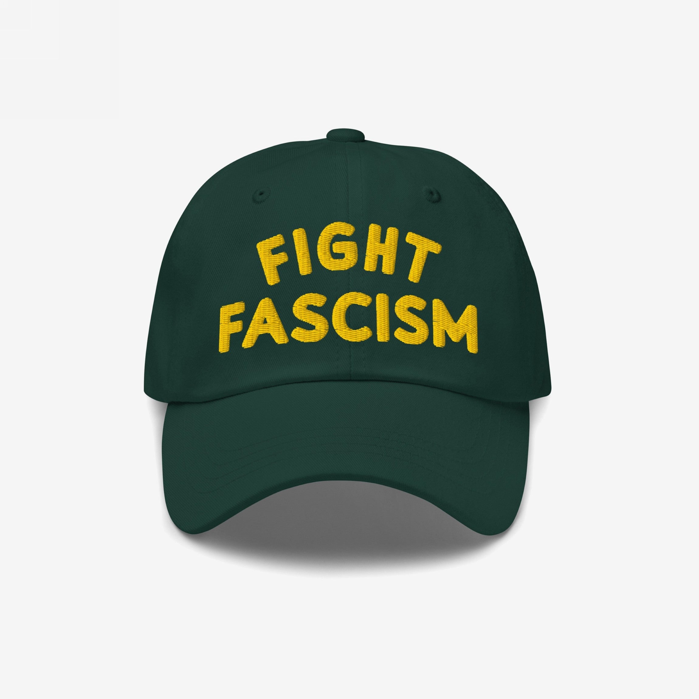Fight Fascism Hat with bold yellow embroidery on a dark green cap, promoting anti-fascist visibility. Ideal for marches and daily wear to spread the message of equality and resistance.