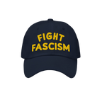 Fight Fascism Hat with bold yellow embroidery on the front, proclaiming FIGHT FASCISM in block letters, ideal for making a vi