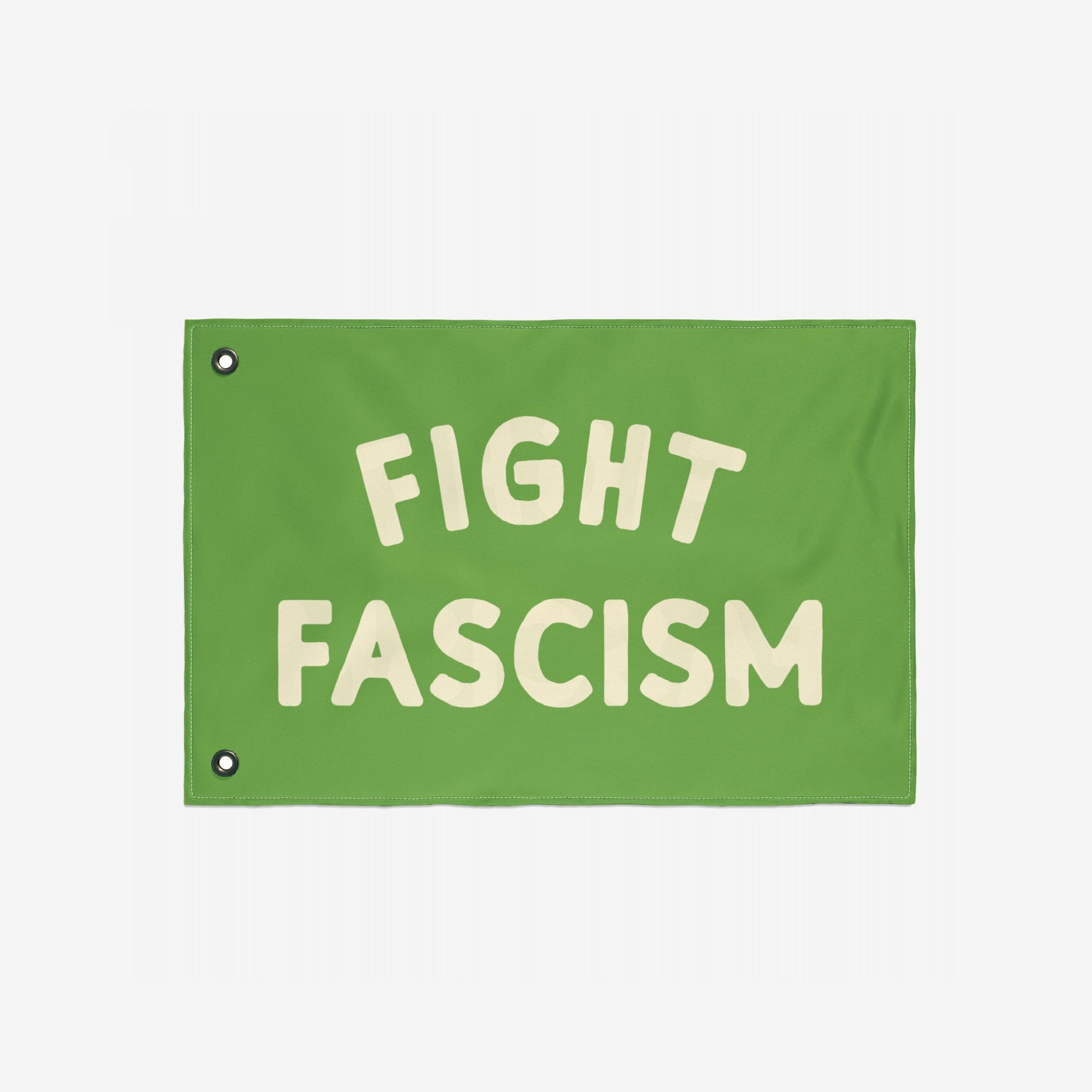 Fight Fascism Flag with bold cream letters on a green background, featuring two metal grommets. Ideal for anti-fascist protests, community events, and promoting equality.