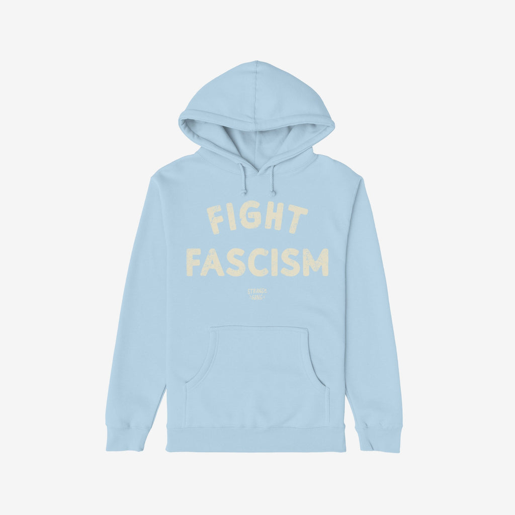 Fight Fascism Hoodie: Light-blue pullover with kangaroo pocket and drawstring hood, featuring bold, distressed cream text FIGHT FASCISM on the chest, embodying protest and activism in style.