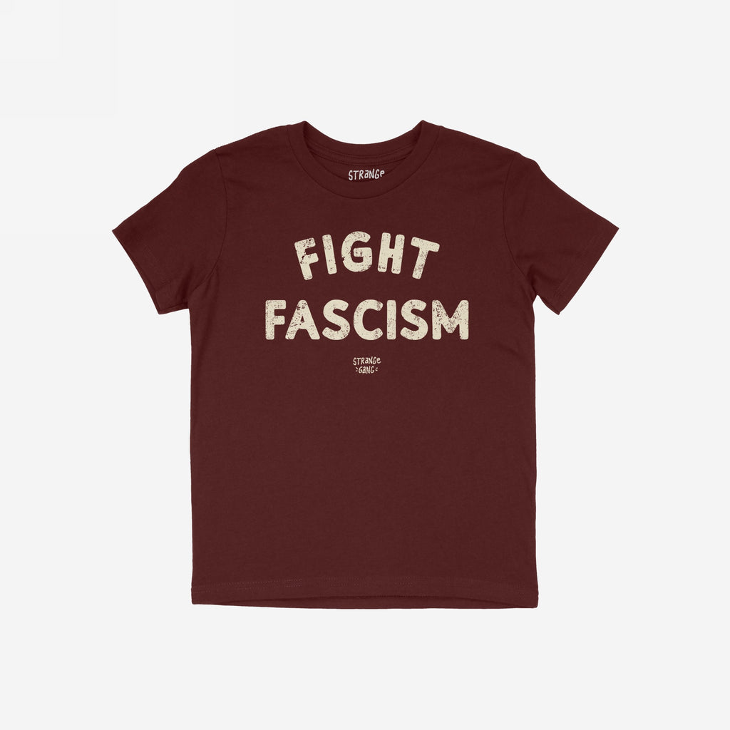 Fight Fascism T-shirt in deep burgundy with distressed off-white text. Bold statement design featuring large FIGHT FASCISM message and smaller brand tagline, embodying protest and resistance ethos.