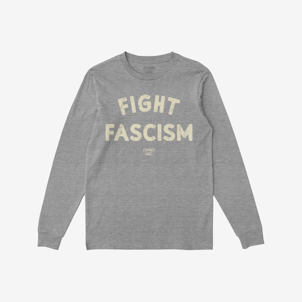 Heather-gray Fight Fascism long-sleeve shirt featuring large, distressed off-white text across the chest, embodying a protest design for anti-fascism activism. Brand name appears subtly below the slogan.