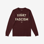 Fight Fascism T-shirt in deep burgundy, featuring bold, distressed off-white lettering. The long-sleeve, crew-neck design is laid flat, emphasizing its powerful anti-fascist slogan for activists and supporters.