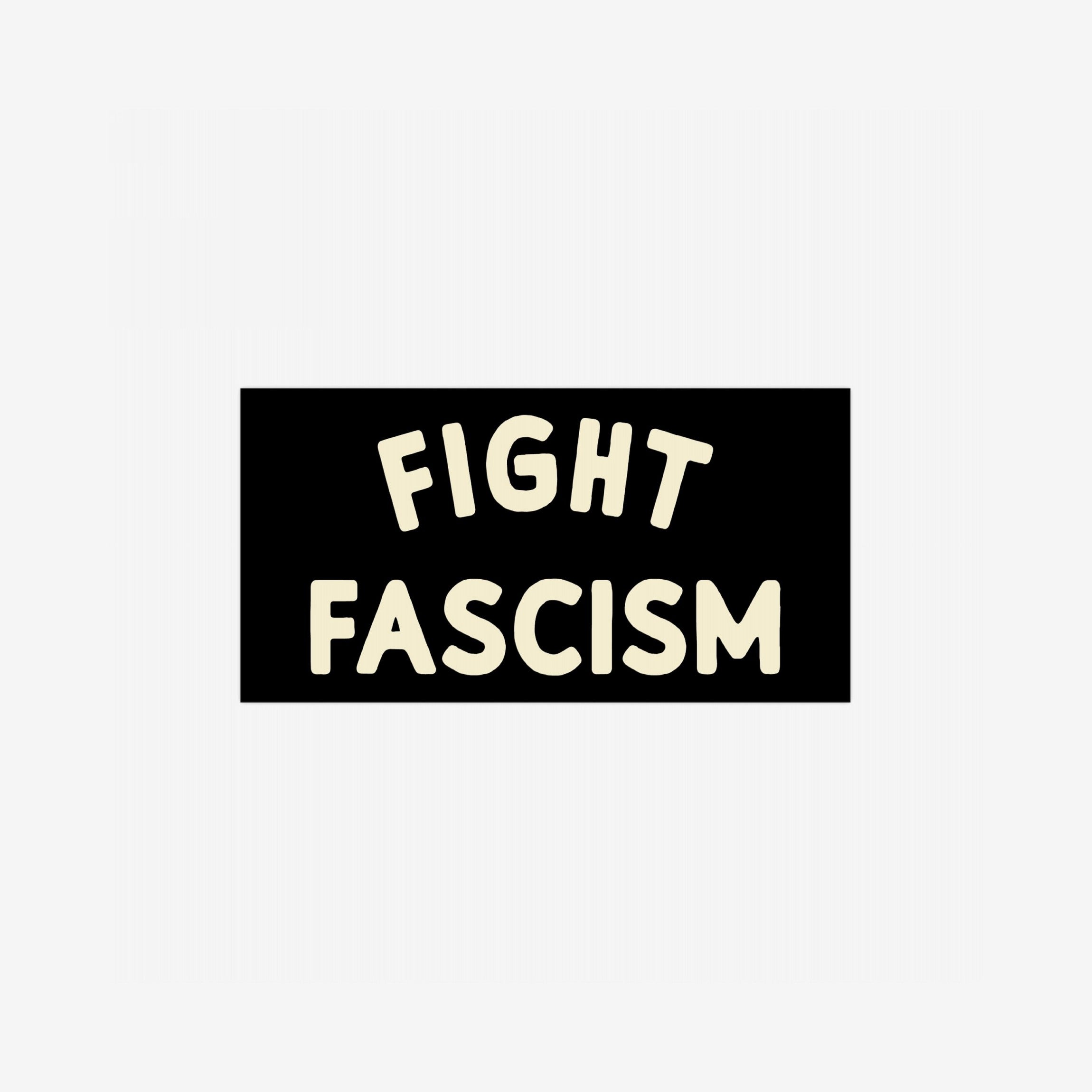 Fight Fascism Sticker & Magnet features bold cream text on black, resembling a protest sign. Ideal for activists, it's available as a 7.5-inch sticker or magnet, perfect for promoting equality.