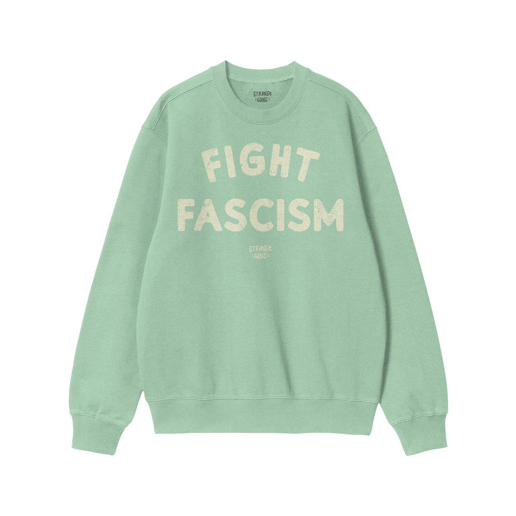 Fight Fascism Crewneck Sweatshirt features distressed off-white block lettering with a small logo. Ideal for protests or ever