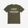 Olive-green cotton Fight Fascism T-shirt with large, distressed cream letters expressing anti-fascist sentiment, ideal for activism and protest. Small branding text beneath.