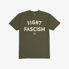 Olive-green cotton Fight Fascism T-shirt with large, distressed cream letters expressing anti-fascist sentiment, ideal for activism and protest. Small branding text beneath.