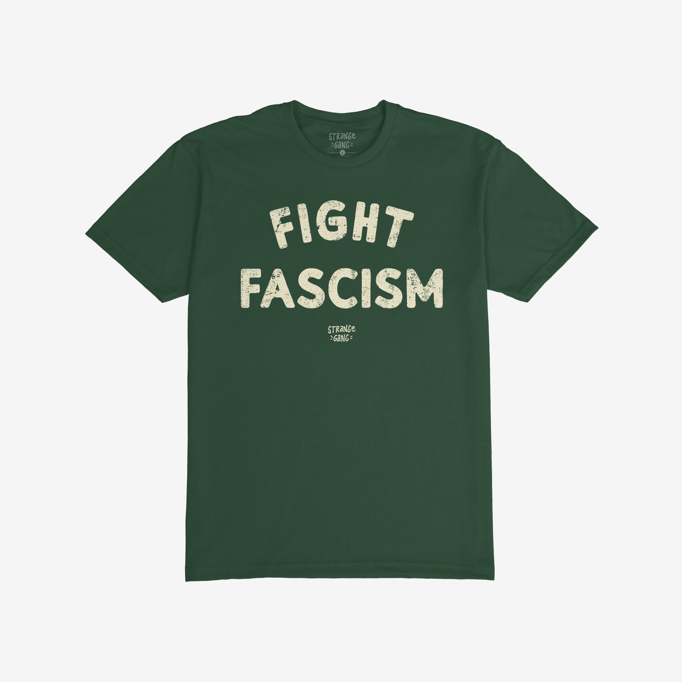 Dark green Fight Fascism T-shirt with large off-white distressed block letters across the chest, symbolizing anti-fascist protest. The smaller brand name appears beneath the main slogan.