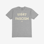 Heather-gray Fight Fascism T-shirt with FIGHT FASCISM in distressed off-white block letters and a small logo below. Ideal for anti-fascist activism and everyday wear.