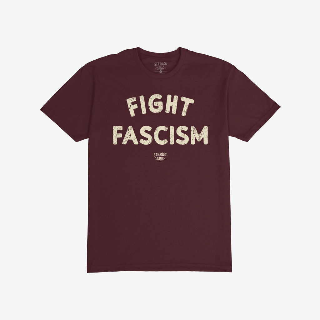 Fight Fascism T-shirt in deep burgundy with distressed off-white text across the chest, designed for anti-fascist activism. Short-sleeve, crew-neck style, ideal for protests and advocating social justice.