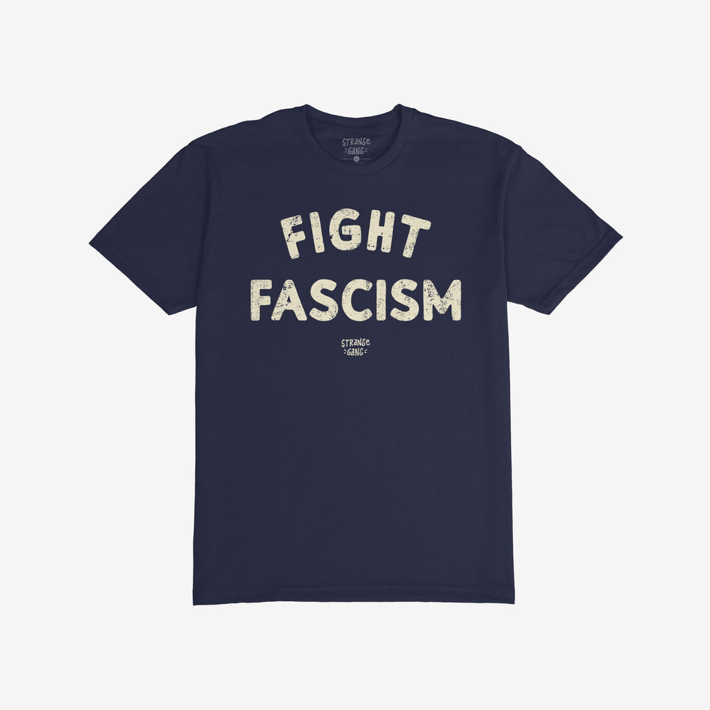Dark/navy-blue Fight Fascism T-shirt with bold, cream, distressed text conveying an anti-fascist message. The design includes the brand name underneath, highlighting activism and resistance. Ideal for marches and activism.