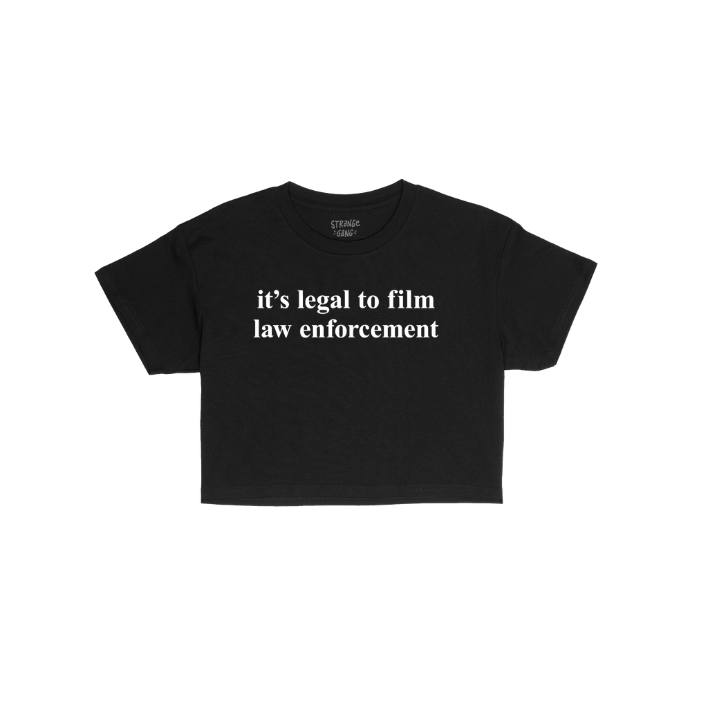 The Film The Police Women's Baby Tee features bold white text advocating for legal rights on a black T-shirt, embodying activ