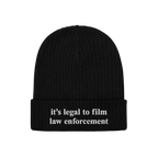 Film The Police Hat: Black knit beanie with folded cuff, featuring embroidered text “it’s legal to film law enforcement.�