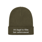 Olive-green ribbed knit beanie, Film The Police Hat, with it’s legal to film law enforcement embroidered in white on the cu