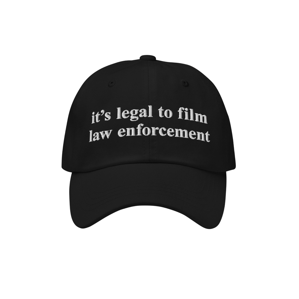 Film The Police Hat featuring bold white embroidery stating it's legal to film law enforcement, captures a powerful message o