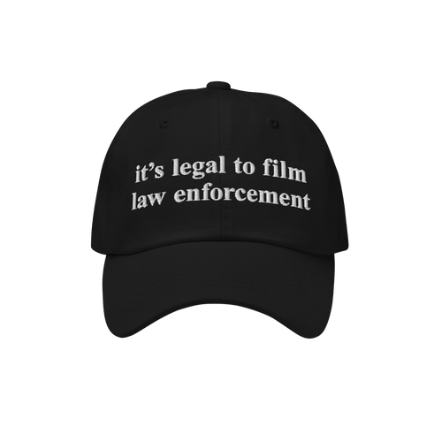 Film The Police Hat featuring bold white embroidery stating it's legal to film law enforcement, captures a powerful message o