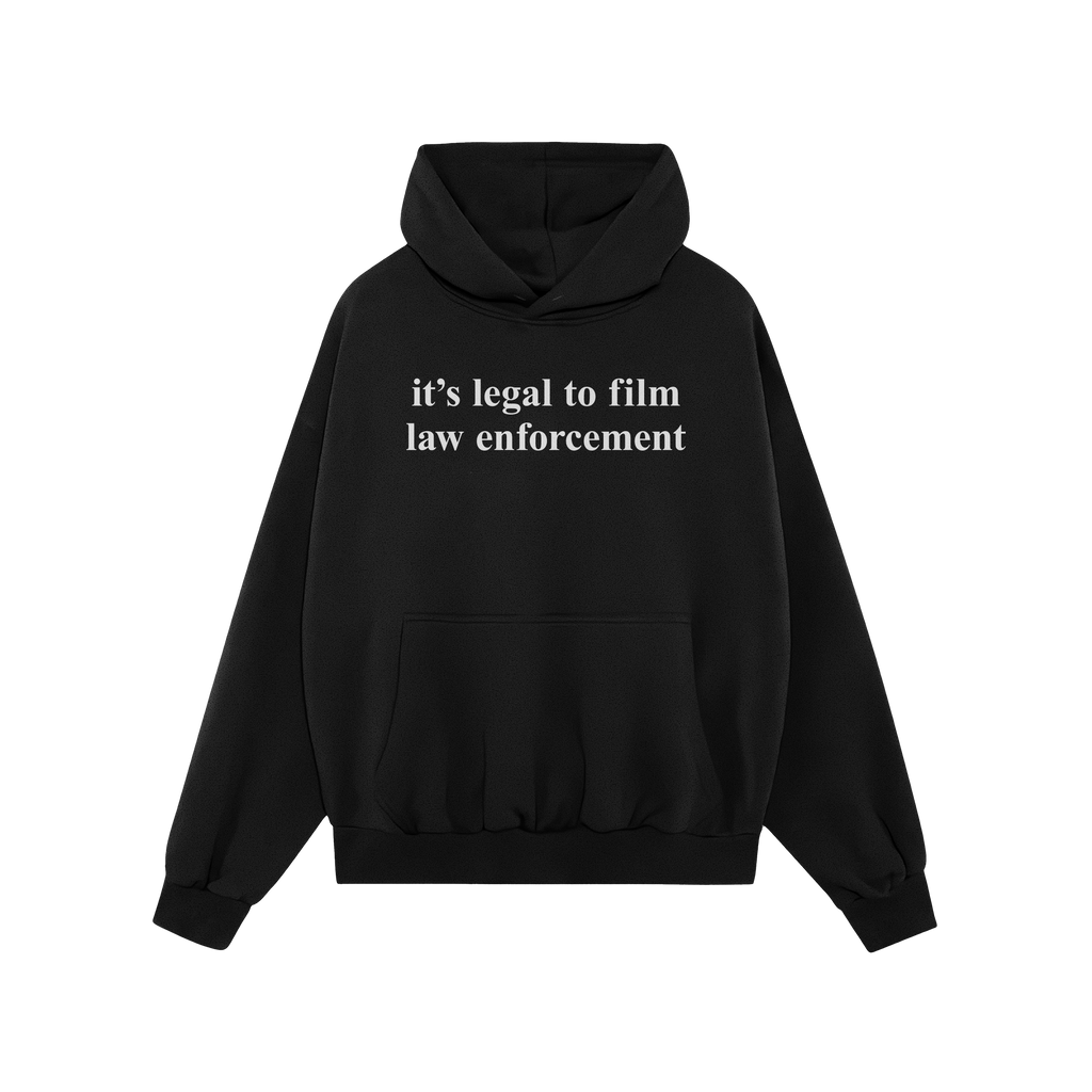 Black pullover Film The Police Hoodie with kangaroo pocket and drawstring hood, featuring bold white text stating it's legal 