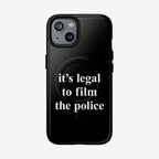 Film The Police iPhone Tough MagSafe Case features a black iPhone in a matching case with the slogan “it’s legal to film the police,” promoting accountability and rights awareness. Fits iPhone 13-17 Pro Max.