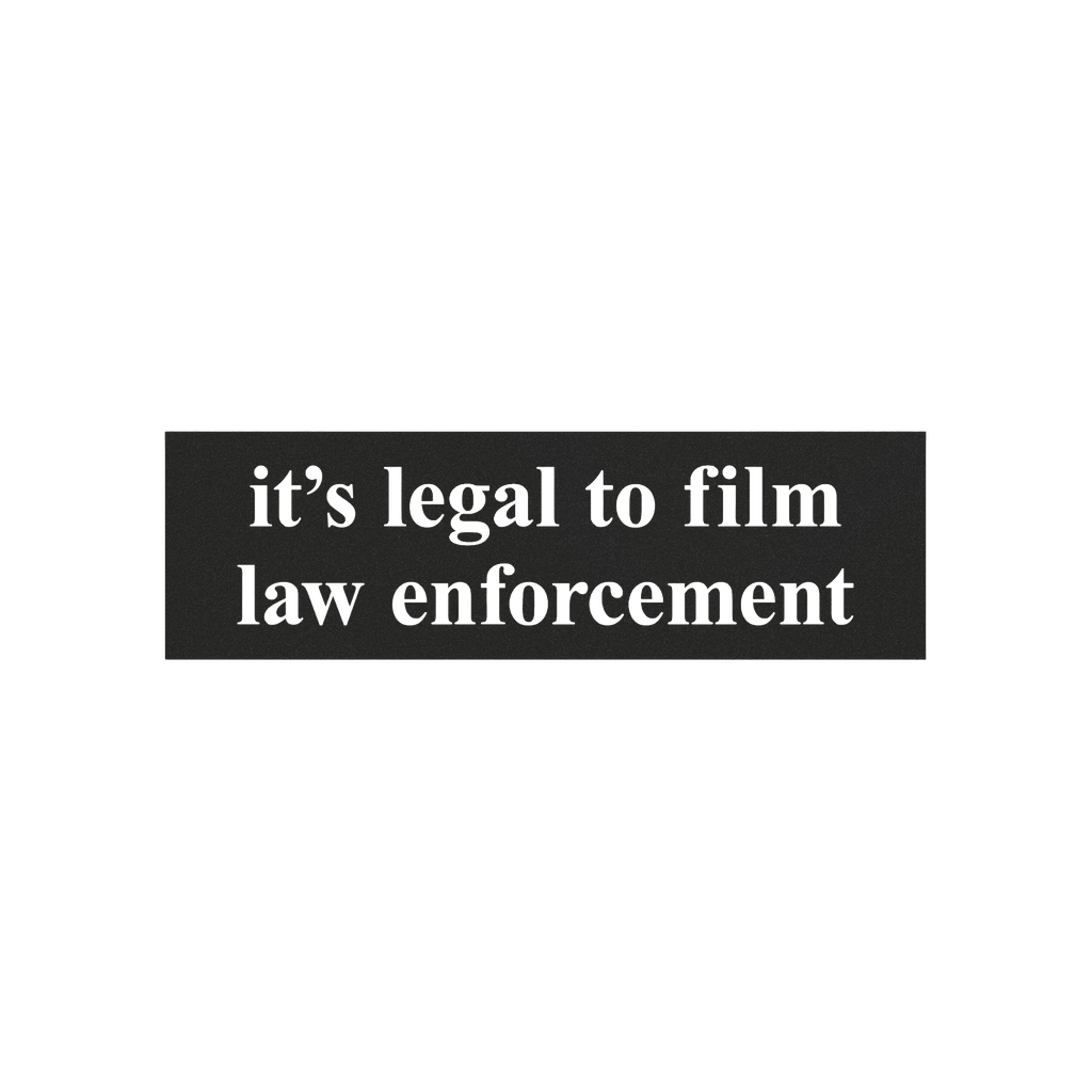 Film The Police Sticker & Magnet features bold white serif text on a black rectangular background, stating it’s legal to fi