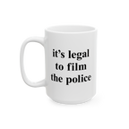 Film The Police Mug features bold black serif-style text on a white ceramic surface, asserting “it’s legal to film the po