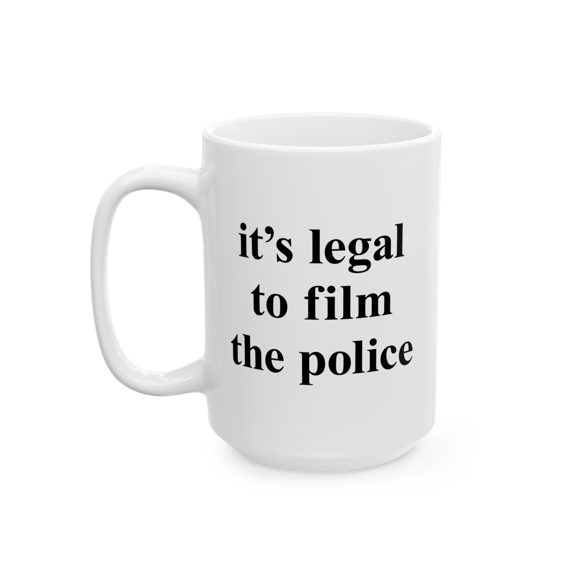 Film The Police Mug features bold black serif-style text on a white ceramic surface, asserting “it’s legal to film the po