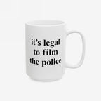 Film The Police Mug features bold black text declaring it’s legal to film the police, emphasizing protest energy. A sturdy ceramic design, available in 11 oz. and 15 oz., microwave and dishwasher safe.