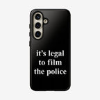 Film The Police Samsung Tough Phone Case displays its bold slogan, “it’s legal to film the police,” on a sleek black case, designed for Samsung Galaxy models S21 to S25 Ultra.