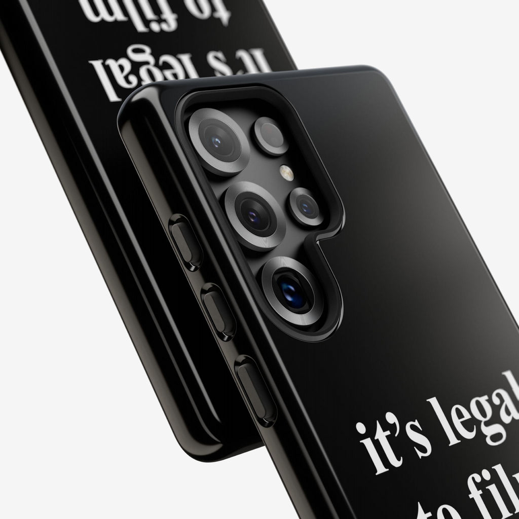 Film The Police Samsung Tough Phone Case showcasing a precise camera cutout for four lenses, side buttons, and bold white text, it's legal to film, on a sleek black protective cover.