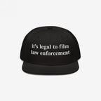 Black Film The Police Hat with flat brim, featuring white embroidered text it’s legal to film law enforcement. Designed for those advocating police accountability and knowing your rights.