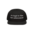 Black Film The Police Hat with flat brim, featuring white embroidered text it’s legal to film law enforcement. Designed for