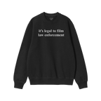 Black crewneck sweatshirt featuring the slogan “it’s legal to film law enforcement” in white text. Part of the Film The