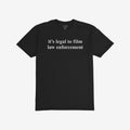 Film The Police T-shirt features the phrase “it’s legal to film law enforcement” in white text on a plain black background, embodying a bold statement with a slightly slim fit design.