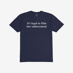 The Film The Police T-shirt features bold white text stating it's legal to film law enforcement on a navy-blue background, embodying a message of activism and awareness.