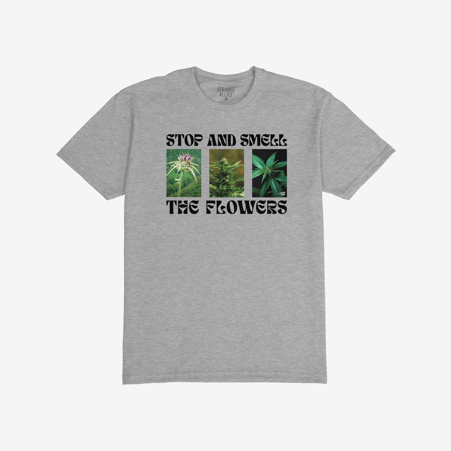 Flowers T-shirt featuring three vertical cannabis images and the slogan “STOP AND SMELL THE FLOWERS” in bold black type, reflecting a playful and rebellious spirit. Brand name “STRANGE ALLIES” inside collar.