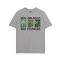 Flowers T-shirt featuring three vertical cannabis images and the slogan “STOP AND SMELL THE FLOWERS” in bold black type, 