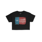 For The Wealthy Women's Baby Tee displays a tattered U.S. flag graphic with the phrase Of the wealthy, by the wealthy, for th