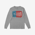 Heather-gray long-sleeve shirt with a distressed American flag design. The red panel reads “Of the wealthy by the wealthy for the wealthy,” capturing a protest message central to the For The Wealthy T-shirt.